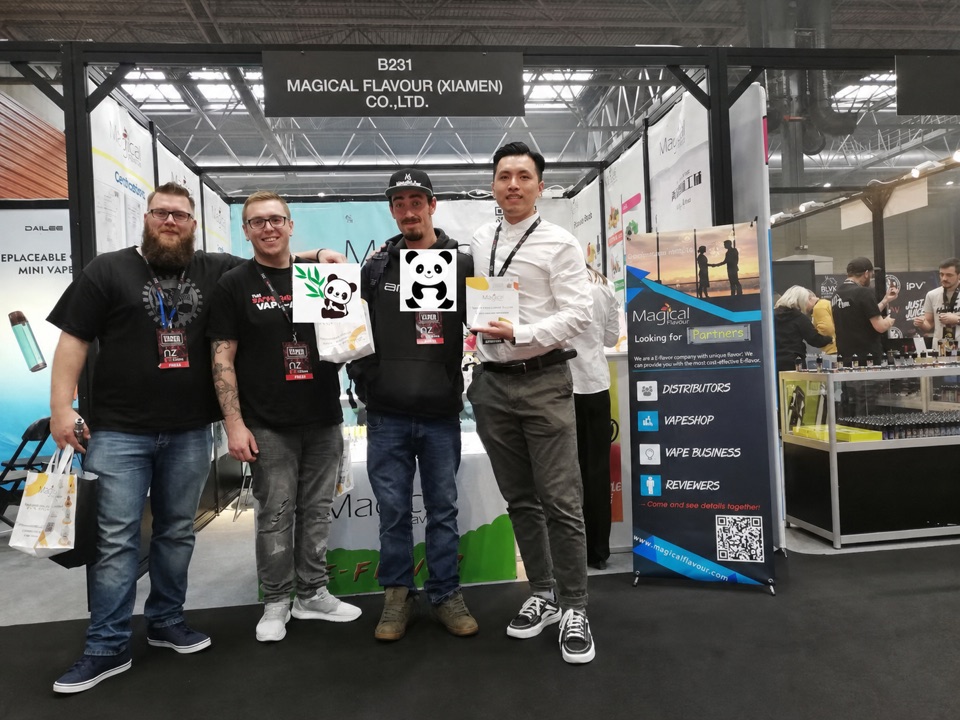 Magical Flavour team with visitors at the Vape Expo UK 2019 booth